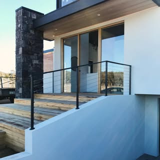 Black cable balustrade on a modern home deck
