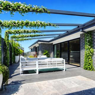 Aluminium pergola over a paved entertaining area